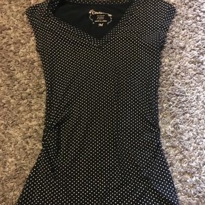 Black with white polka dots v cut shirt